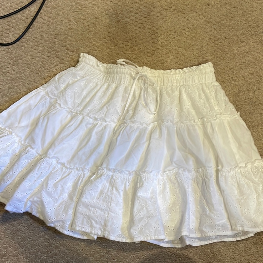 All white ruffle skirt